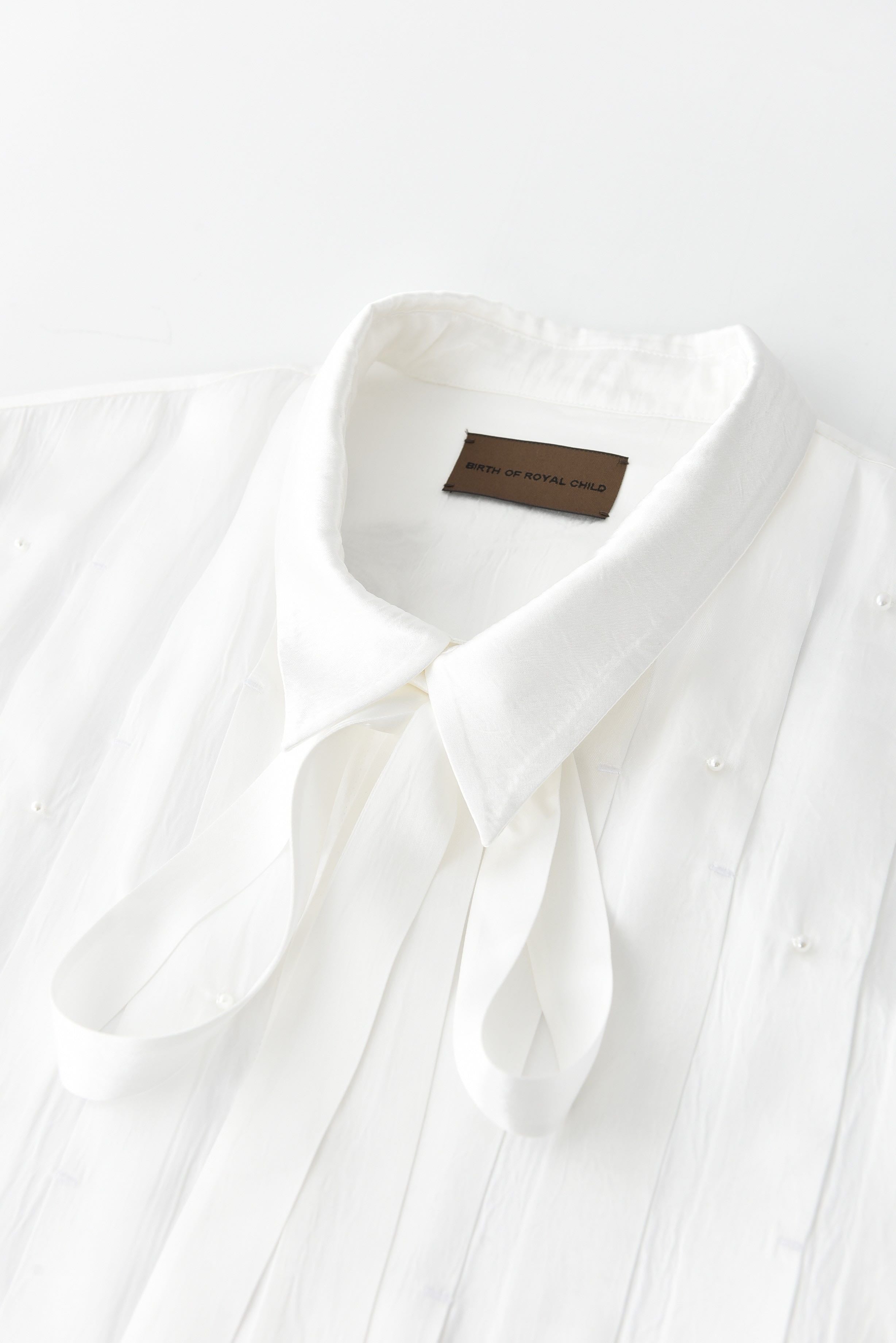 PEARL PLEATED SHIRT