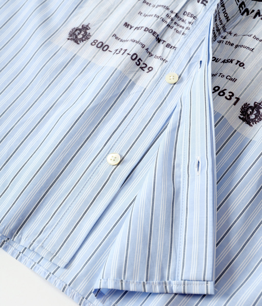 Blue and white striped shirt with printed text and phone numbers on a white background