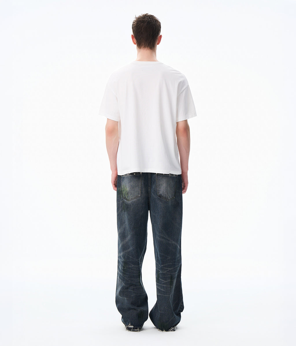 Knee Slide Distressed Jeans