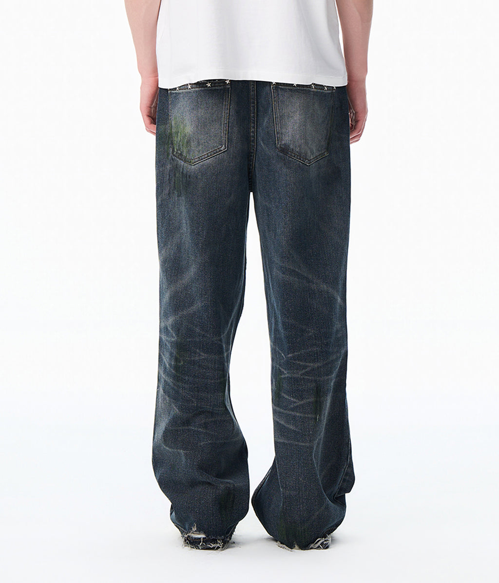 Knee Slide Distressed Jeans